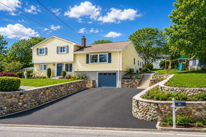driveway expansion with stone retaining walls and steps in Dedham MA — M Coelho Group