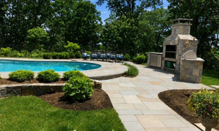 Healthy well-maintained front lawn in Southborough MA — M Coelho Group